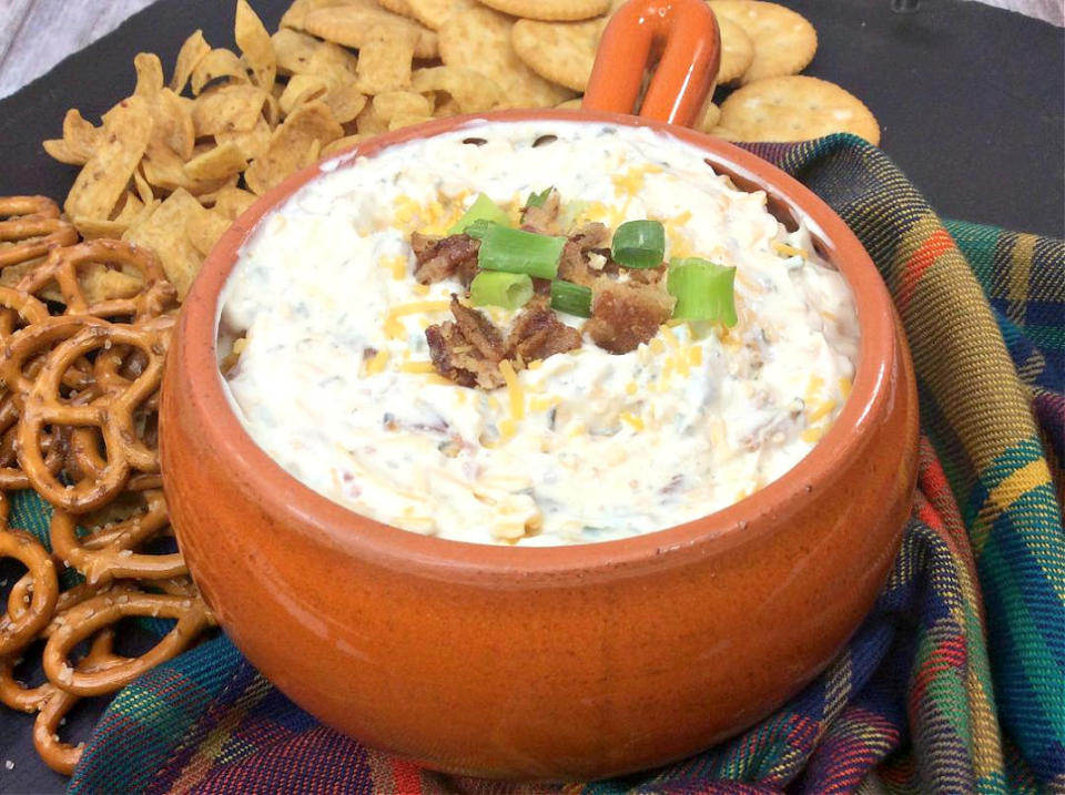 <p>Pam Beth</p><p>Pro tip: Double the recipe. Your guests will thank you.</p><p><strong>Get the recipe: <a href="https://parade.com/1159672/pambeth/bacon-cheddar-ranch-dip/" rel="nofollow noopener" target="_blank" data-ylk="slk:Bacon Cheddar Ranch Dip;elm:context_link;itc:0;sec:content-canvas" class="link ">Bacon Cheddar Ranch Dip</a></strong></p>