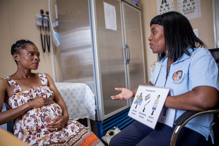 Nkosi, right, mentoring a mother-to-be. 