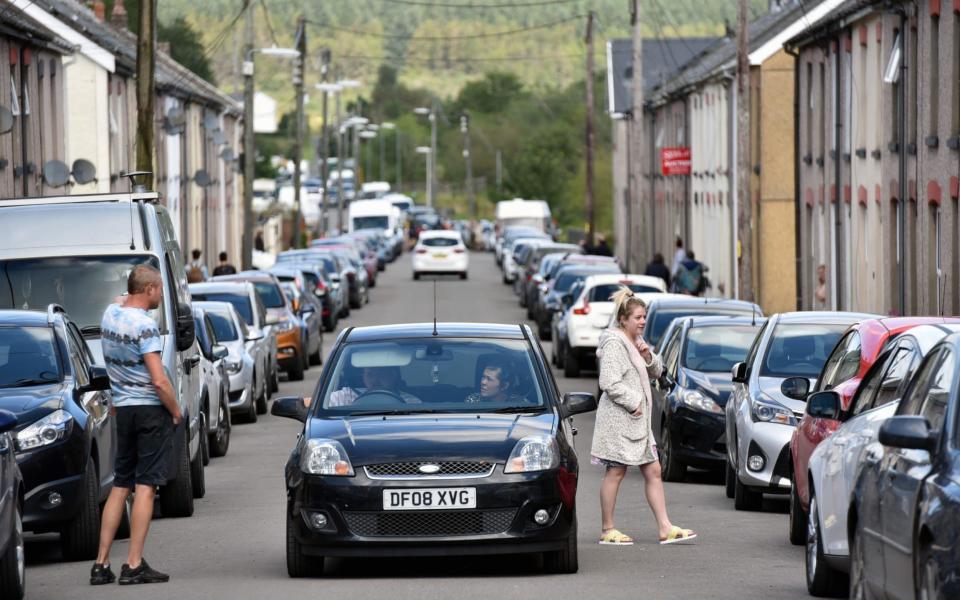 Rave which started in the early hours of Sunday in the forest at Neath Port Talbot, near the village of Banwen. Locals find it impossible to park their cars. - Richard Swingler