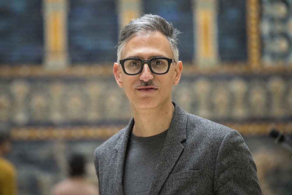 Director of Hamburger Bahnhof in Berlin, Sam Bardaouil poses for a portrait during a press preview for Filtered Time exhibition of British artist Liam Gillick at Pergamon Museum in Berlin, Tuesday, April 4, 2023. A new light and sound installation by British contemporary artist Liam Gillick, part of the show Filtered Time, opened Tuesday at one of the German capital's most popular museums. (AP Photo/Stefanie Loos)