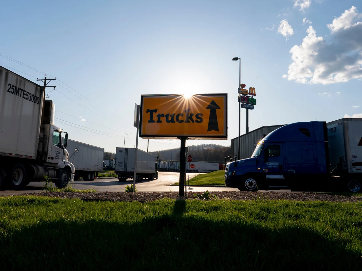 Semitrucks head to the truck parking lot at the Love's Travel Stop truck stop in Virginia.