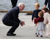 The Duchess of Cambridge, Princess Charlotte and Prince George speak to Governor General David Johnston as they depart from Victoria. Photo: REX/Shutterstock