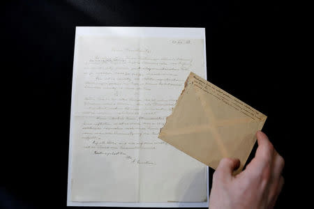 A letter written by Albert Einstein in 1928, in which according to the auction house he outlined ideas for his "Third Stage of the Theory of Relativity", is seen before it is sold at an auction in Jerusalem, March 6, 2018. REUTERS/Ronen Zvulun