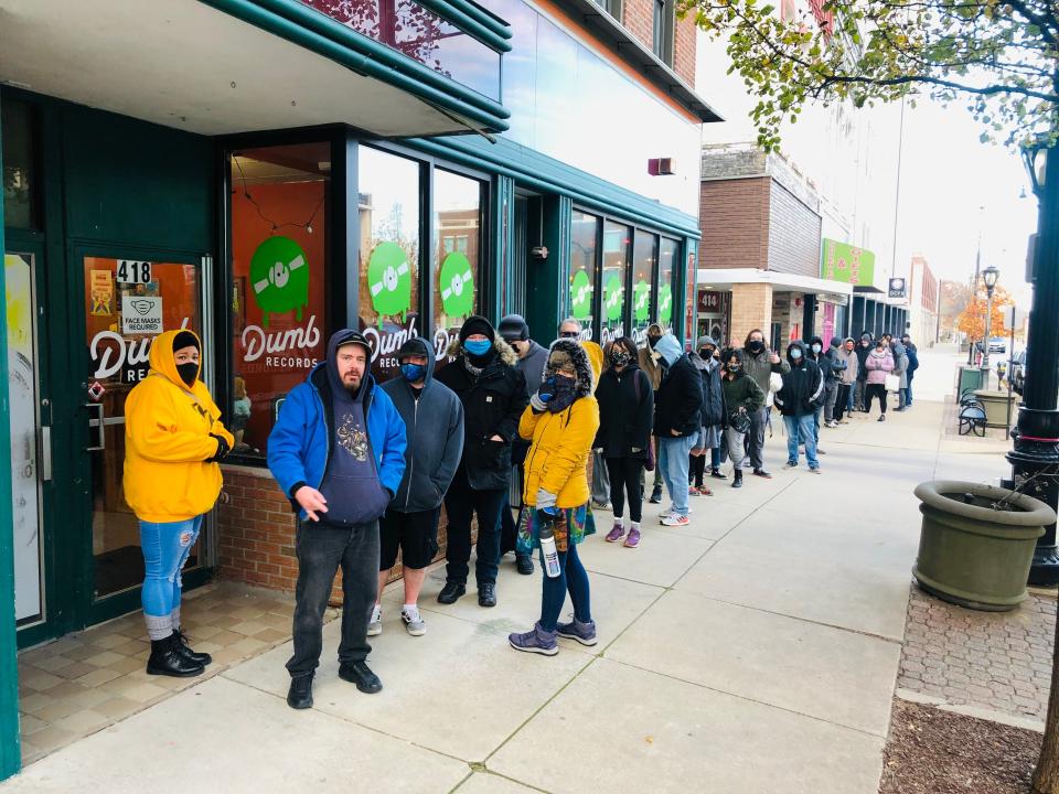 A long line of customers waits outside Dumb Records in downtown Springfield for Black Friday Record Store Day. Owner Brian Galecki said it was comparable to other Record Store Days dispersed throughout the year.