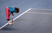 Serena Williams of the U.S. reacts during a practice session at Melbourne Park January 9, 2013, ahead of the Australian Open tennis tournament which begins on Monday. REUTERS/Tim Wimborne (AUSTRALIA - Tags: SPORT TENNIS)