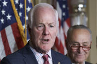 FILE - Sen. John Cornyn, R-Texas, joined at right by Senate Majority Leader Chuck Schumer, D-N.Y., speaks after passage of a bill to encourage more semiconductor production in the U.S., at the Capitol in Washington, July 27, 2022. As the Justice Department’s probe into former President Donald Trump’s possession of White House materials deepens, lawmakers of both parties have more questions than answers. “We need to be able to do appropriate oversight for the Intelligence Committee so that we have a better handle on how this particular incident was handled, but so that we avoid problems like this in the future," said Cornyn. (AP Photo/J. Scott Applewhite, File)