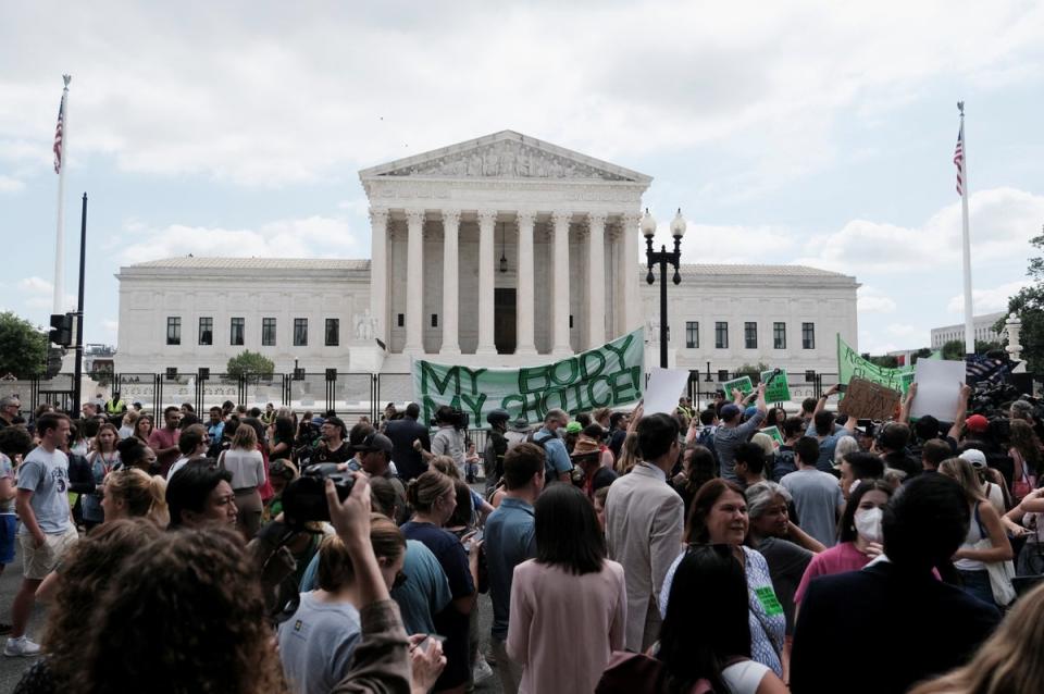 Thousands gather outside the Supreme Court (REUTERS)