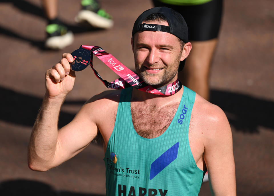 LONDON, ENGLAND - OCTOBER 02: (EDITORIAL USE ONLY) Harry Judd completes the 2022 TCS London Marathon on The Mall on October 02, 2022 in London, England. (Photo by Karwai Tang/WireImage)