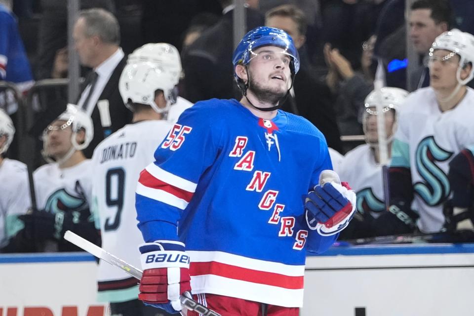 New York Rangers' Ryan Lindgren (55) reacts after scoring an empty-net goal during the third period of an NHL hockey game against the Seattle Kraken, Friday, Feb. 10, 2023, in New York. (AP Photo/Frank Franklin II)