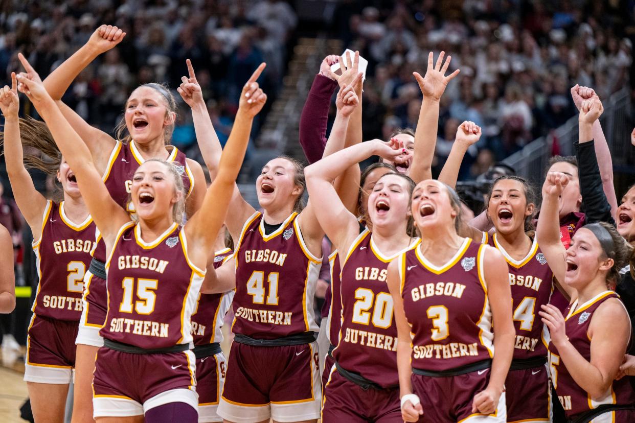 Gibson Southern High School players celebrate after winning an IHSAA class 3A girls’ basketball state finals game against Norwell High School, Saturday, Feb. 24, 2024, at Gainbridge Fieldhouse, in Indianapolis. Gibson Southern won, 63-60.