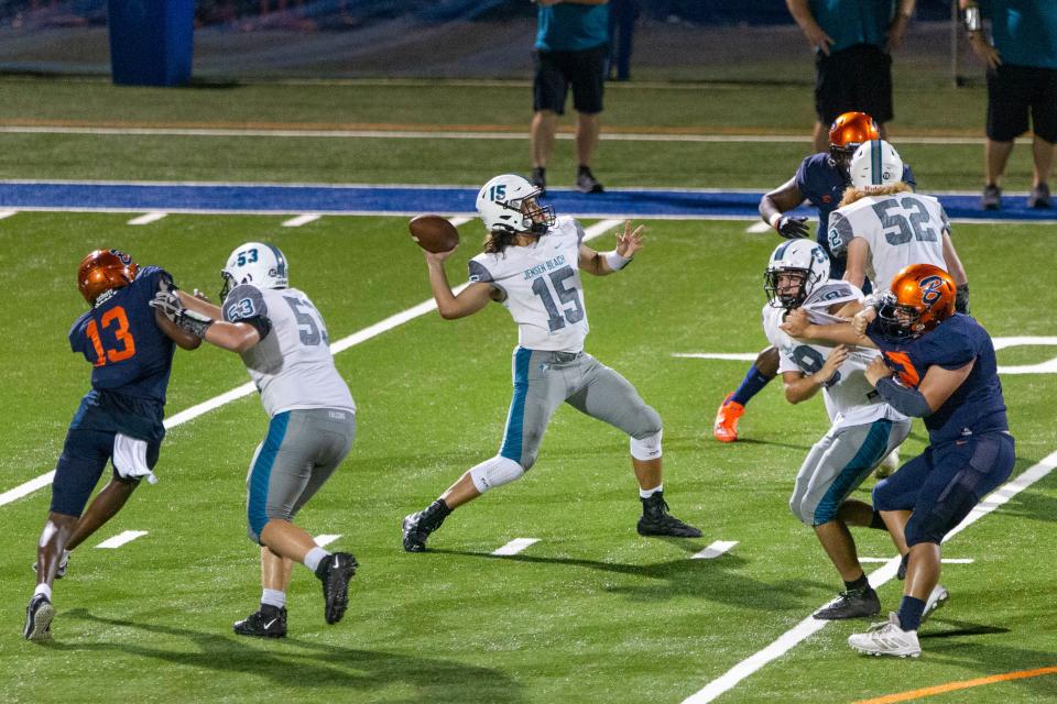 Jensen Beach quarterback Gio Cascione throws the ball against Benjamin in Palm Beach Gardens on September 22, 2022.