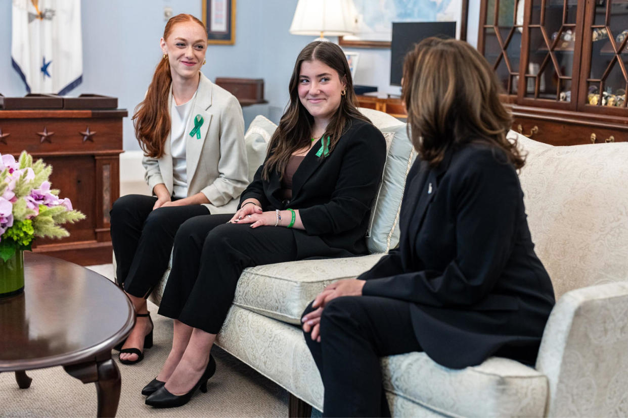 From left: Ella Seaver and Emma Ehrens sit next to Kamala Harris on the couch (Lawrence Jackson/White House)