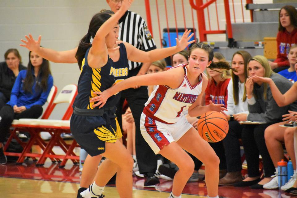 Martinsville's Marina Rautenkranz is heavily guarded by the Mooresville defense during the rivarly matchup between the Artesians and Pioneers on Nov. 22, 2022.