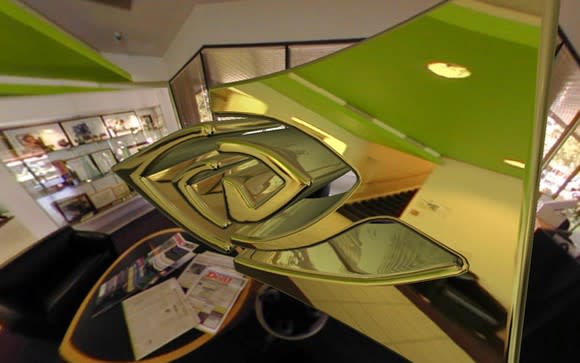 Freeform rendition of the NVIDIA logo, floating in an office environment.