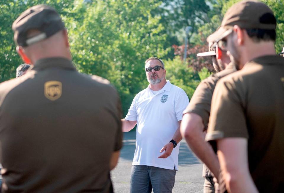 Union representative Eric Kime talks to local UPS workers about the potential strike outside the State College UPS Customer Center on Thursday, July 13, 2023.