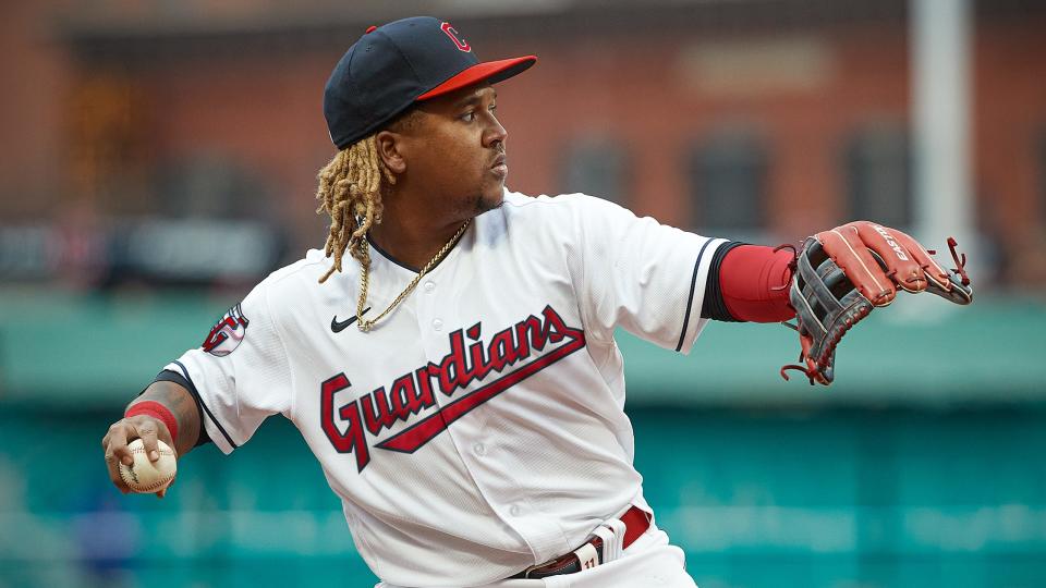 Jose Ramirez in a white Guardians uniform.