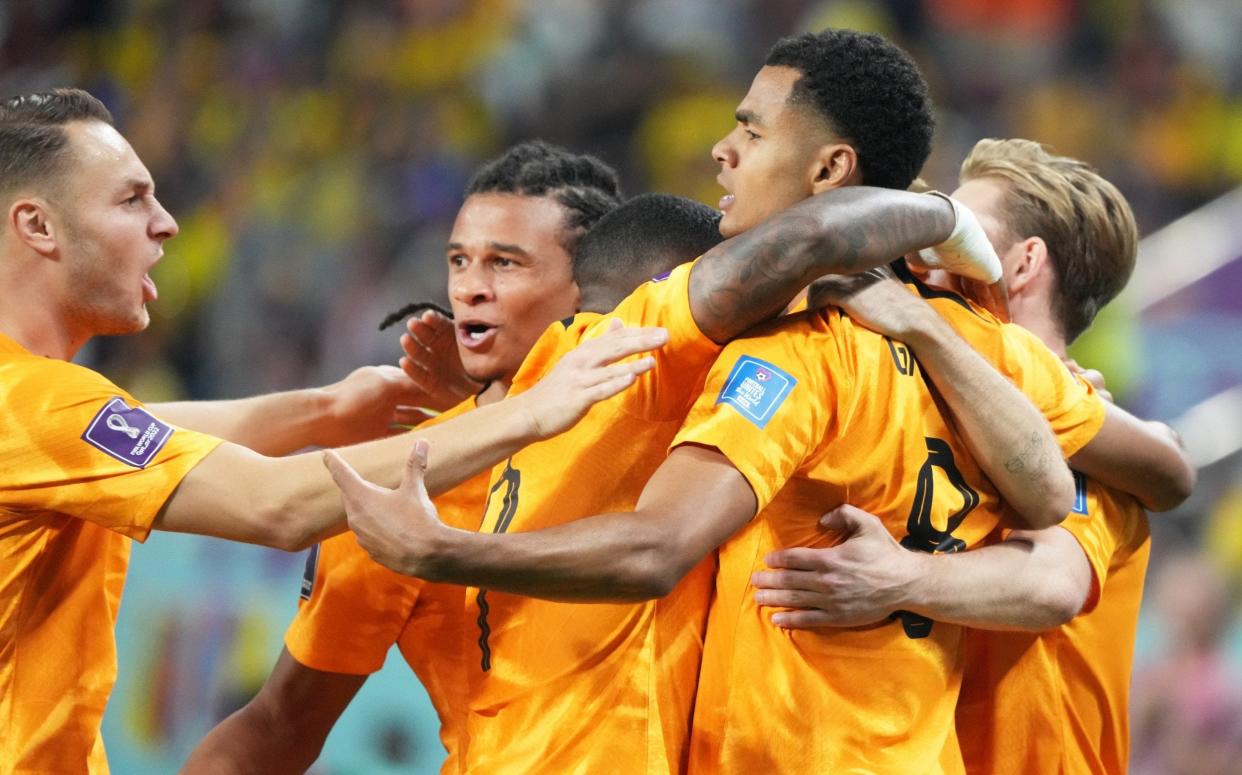 Cody Gakpo celebrates scoring for Holland - Etsuo Hara/Getty Images