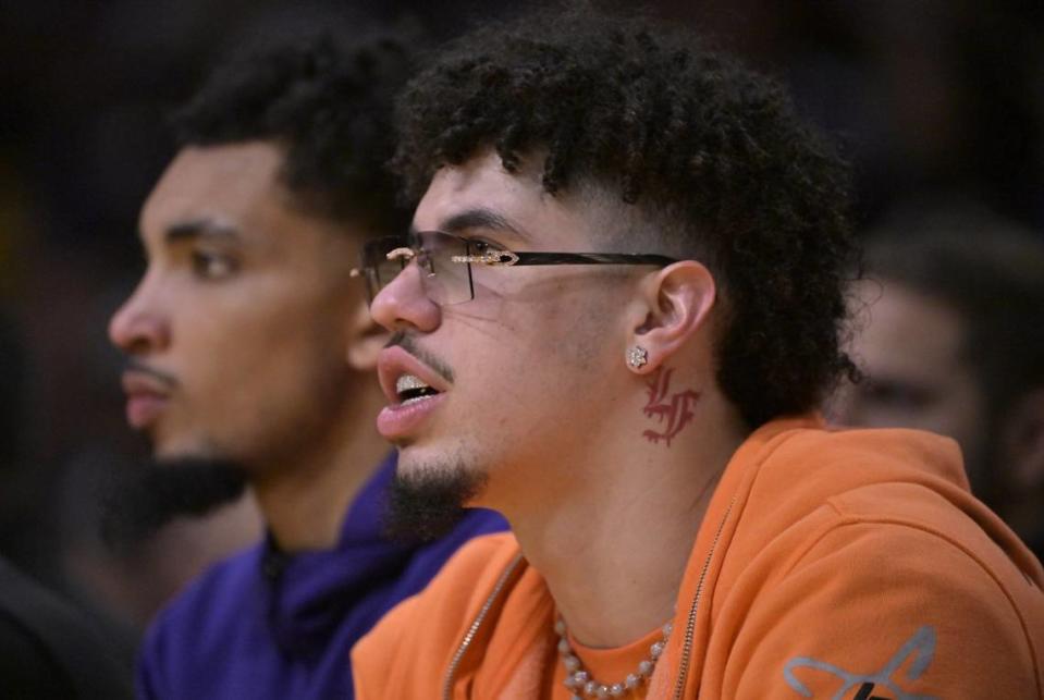 Dec 28, 2023; Los Angeles, California, USA;  Charlotte Hornets guard LaMelo Ball (1) looks on from the bench against the Los Angeles Lakers at Crypto.com Arena. Mandatory Credit: Jayne Kamin-Oncea-USA TODAY Sports