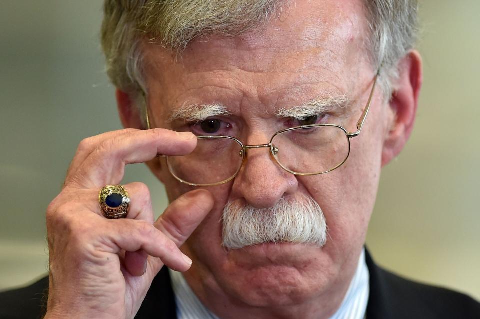 Then-national security adviser John Bolton answers journalists questions in Minsk, Belarus, on Aug 29. 2019.