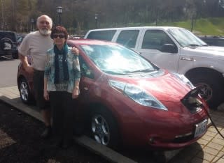 Rick and Linda SantAngelo with the 2011 Nissan Leaf at 96,000 miles