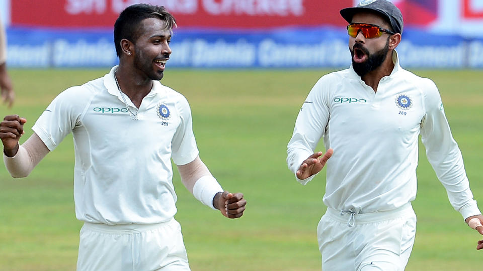 Hardik Pandya and Virat Kohli. (Image: LAKRUWAN WANNIARACHCHI/AFP/Getty Images)