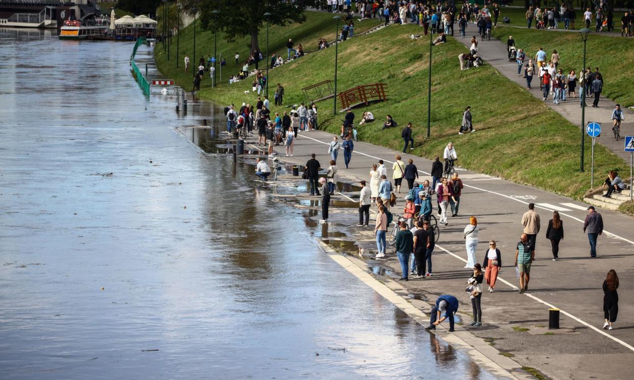 <span>Flooding along the Vistula River in Kraków, Poland.</span><span>Photograph: Beata Zawrzel/NurPhoto/Rex/Shutterstock</span>