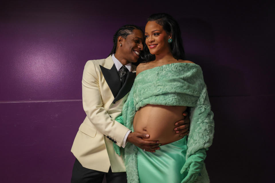 HOLLYWOOD, CA - MARCH 12: ASAP Rocky and Rihanna backstage at the 95th Academy Awards at the Dolby Theatre on March 12, 2023 in Hollywood, California. (Robert Gauthier / Los Angeles Times via Getty Images)