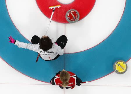 Curling - Pyeongchang 2018 Winter Olympics - Women's Round Robin - Switzerland v Japan - Gangneung Curling Center - Gangneung, South Korea - February 21, 2018 - Skip Satsuki Fujisawa of Japan gestures as skip Silvana Tirinzoni of Switzerland looks on. REUTERS/Lucy Nicholson