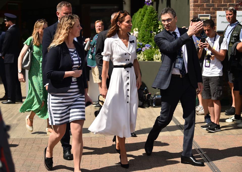 Britain's Catherine, Duchess of Cambridge arrives at Court 14 to watch Britain's Harriet Dart playing against US player Christina McHale at The All England Tennis Club in Wimbledon, southwest London, on July 2, 2019, on the second day of the 2019 Wimbledon Championships tennis tournament. (Photo by Glyn KIRK / AFP) / RESTRICTED TO EDITORIAL USE        (Photo credit should read GLYN KIRK/AFP/Getty Images)