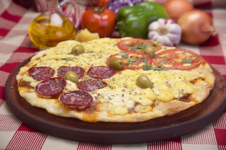 Parecchio es un ristorantino que se destaca por su lograda pizza, que claro, ¡siempre debe acompañarse con fainá!