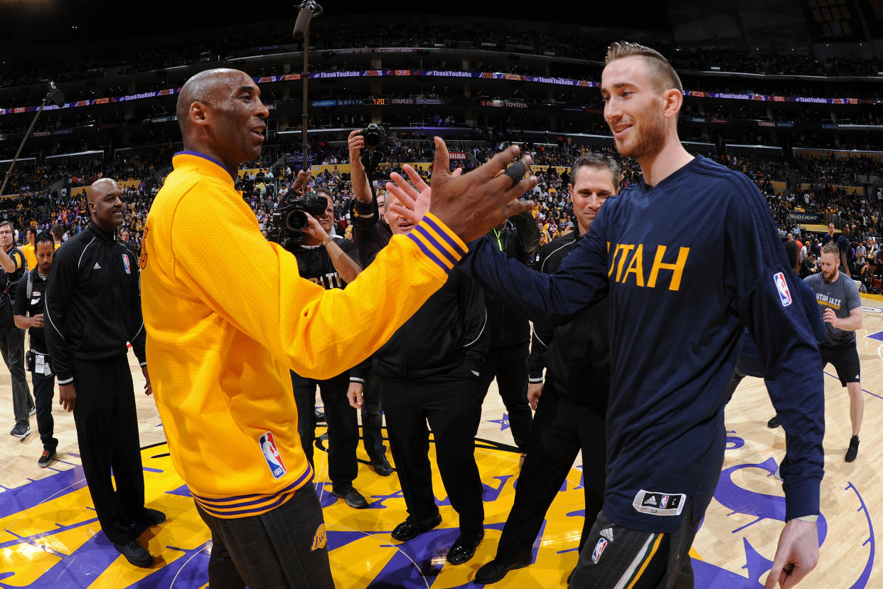 Kobe Bryant and Gordon Hayward shake hands prior to Bryant’s final NBA game on April 12, 2016. (Getty)