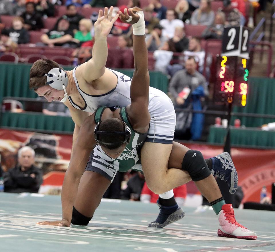Fairless' Max KIrby works to take down Tyler Lillard of Aurora in their Division II 165 pound state championship match.