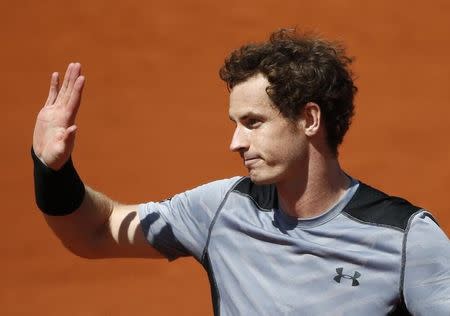 Andy Murray of Britain celebrates after defeating Jeremy Chardy of France during their men's singles match during the French Open tennis tournament at the Roland Garros stadium in Paris, France, June 1, 2015. REUTERS/Vincent Kessler