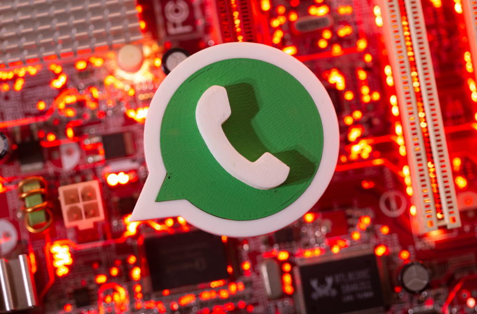 A 3D printed Whatsapp logo is placed on a computer motherboard in this illustration taken January 21, 2021. REUTERS/Dado Ruvic/Illustration