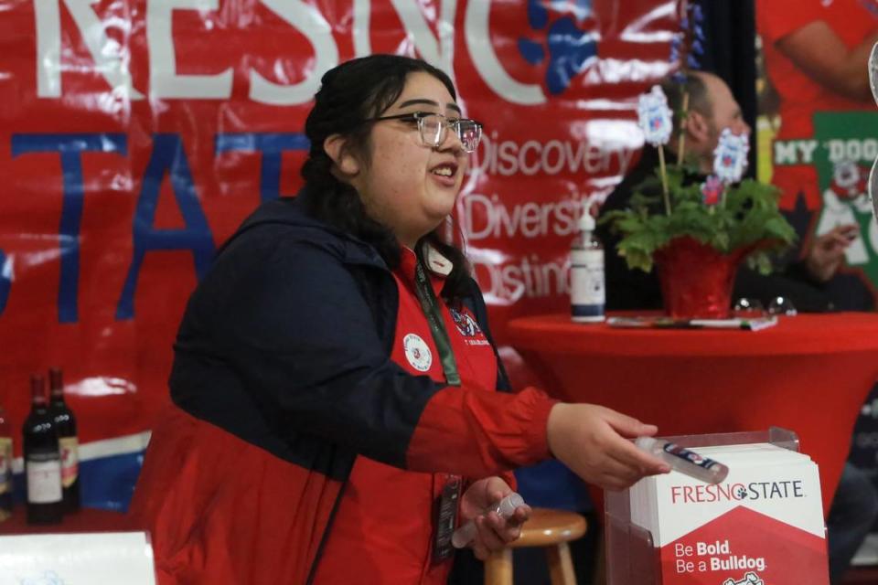 Fresno State student Artemisa De la Cruz, spent her Tuesday morning at the info booth for the Jordan College of Agricultural Sciences and Technology in the Ag Career and Education tent at the World Ag Expo providing education about the many options in the agricultural field.  