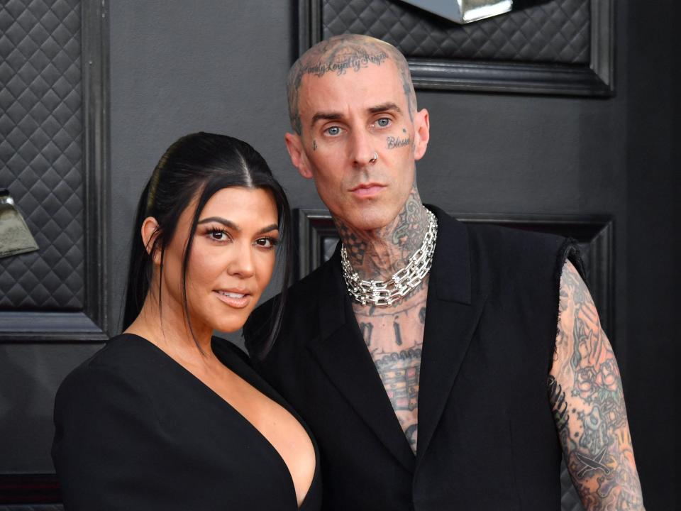 Kourtney Kardashian and musician Travis Barker arrive for the 64th Annual Grammy Awards at the MGM Grand Garden Arena in Las Vegas on April 3, 2022.