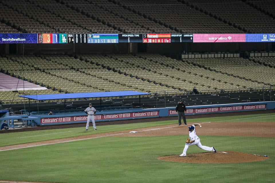 Dodgers closer Kenley Jansen delivers a pitch during the ninth inning.