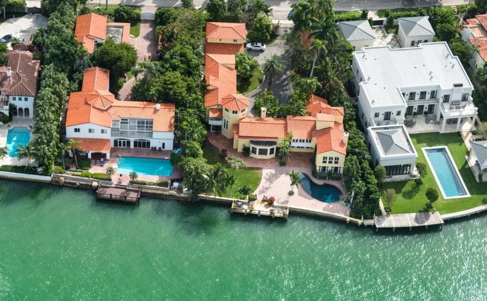 Aerial view of a row of villas - each with a swimming pool - in Miami, Florida (Getty Images)