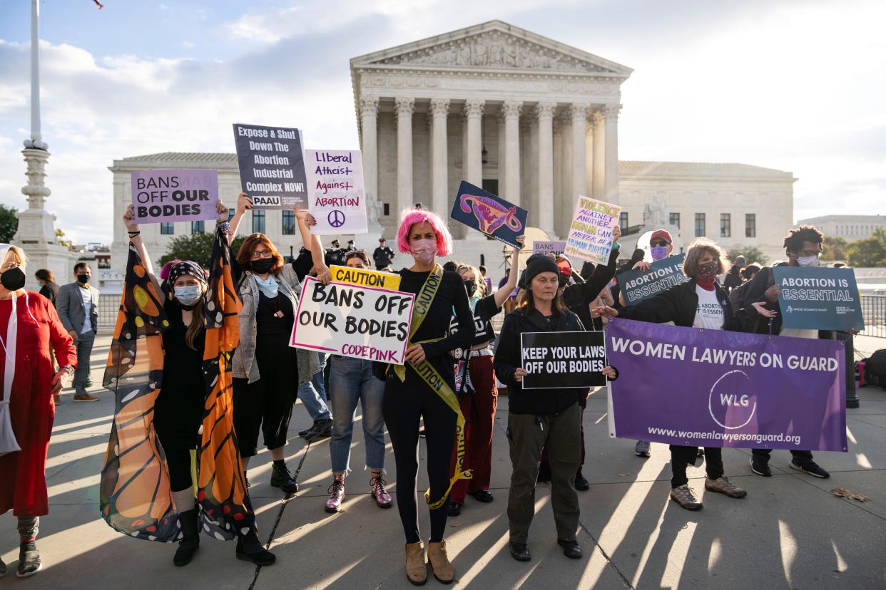 Demonstrators rally outside the U.S. Supreme Court on Nov. 1, in Washington, D.C.