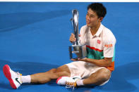 Tennis - Brisbane International - Men's Final - Pat Rafter Arena, Brisbane, Australia, January 6, 2019 Japan's Kei Nishikori celebrates with the trophy after winning the final against Russia's Daniil Medvedev REUTERS/Patrick Hamilton