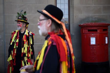 Members of Wath-Upon-Dale Morris dancing group stand before their performance whilst wearing their costumes in Whitby, Britain March 2, 2019. REUTERS/Clodagh Kilcoyne