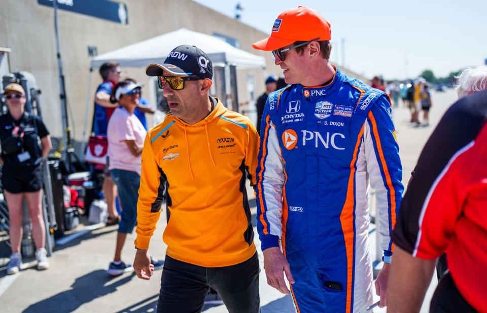 Arrow McLaren SP driver Tony Kanaan, left, and Chip Ganassi Racing driver Scott Dixon (9) make their way to the track during last weekend's qualifying for the Indianapolis 500.