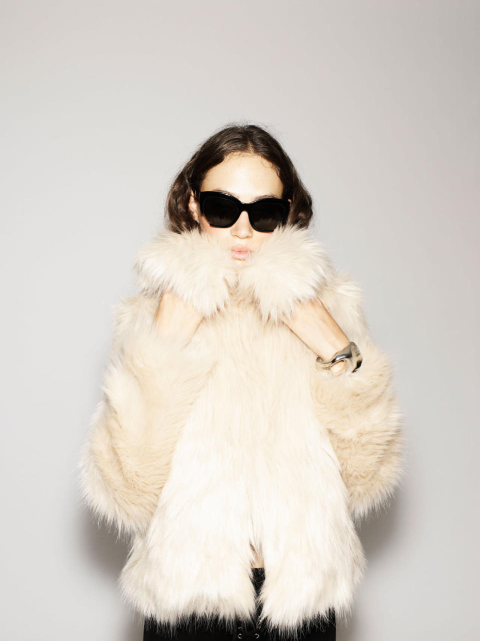 Bye, we’ll see you this fall wearing this snug ivory coat. 