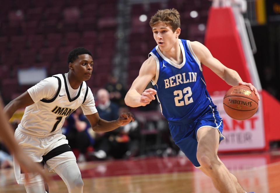 Berlin Brothersvalley's Pace Prosser (22) drives around Imani Christian's R.J. Sledge (1) in the PIAA Class 1A boys' basketball championship, March 21, at the Giant Center in Hershey.