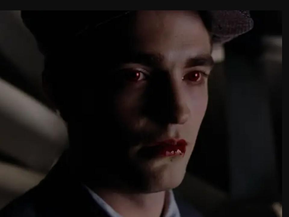Edward with blood on his mouth and red eyes in "Twilight"