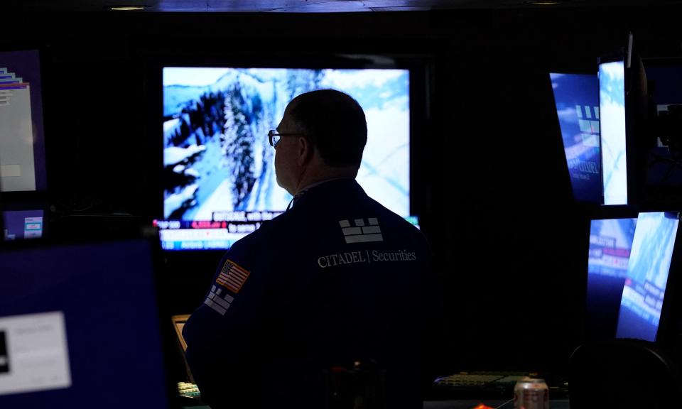 Traders work on the floor of the New York Stock Exchange at the opening bell on February 22 2022, in New York. - Wall Street stocks retreated early on February 22 as Russian President Vladimir Putin&#39;s latest escalation of the Ukraine conflict stoked volatility in markets. (Photo by TIMOTHY A. CLARY / AFP) (Photo by TIMOTHY A. CLARY/AFP via Getty Images)