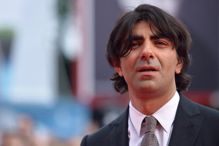 Turkish director Fatih Akin arrives for the screening of the movie "The Cut" presented in competition at the 71st Venice Film Festival on August 31, 2014 at Venice Lido