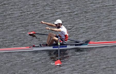 2018 European Championships - Rowing, Lightweight Men's Single Sculls Final A - Strathclyde Country Park, Glasgow, Britain - August 5, 2018 - Michael Schmid of Switzerland celebrates after winning the race. REUTERS/Russell Cheyne