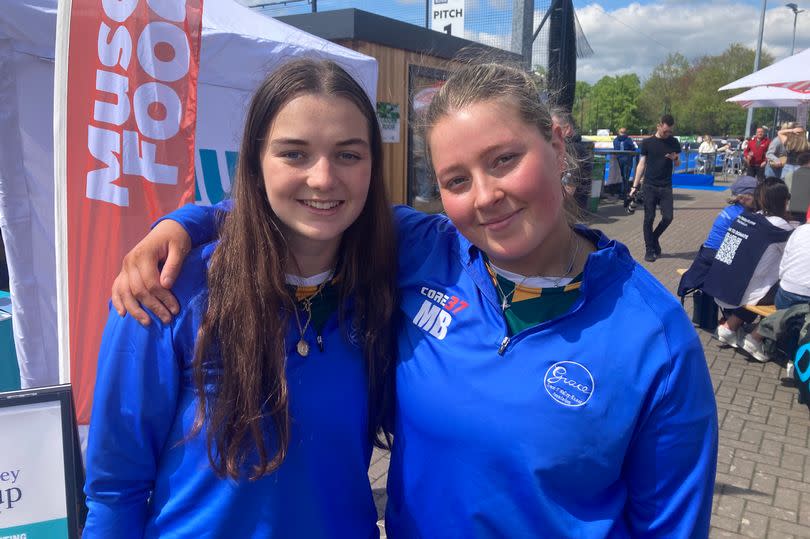 Nicola Fletcher and Mia Brown, close friends of Grace O'Malley-Kumar, picturing wearing blue tops with the logo of the foundation set up in Grace's memory