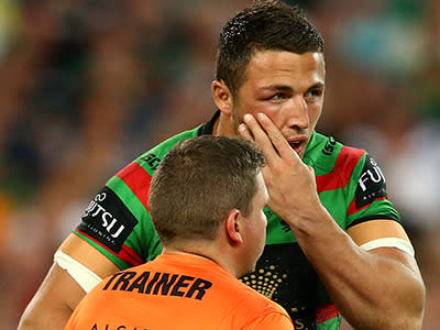 Sam Burgess nursing his cheekbone after a heavy head collision.